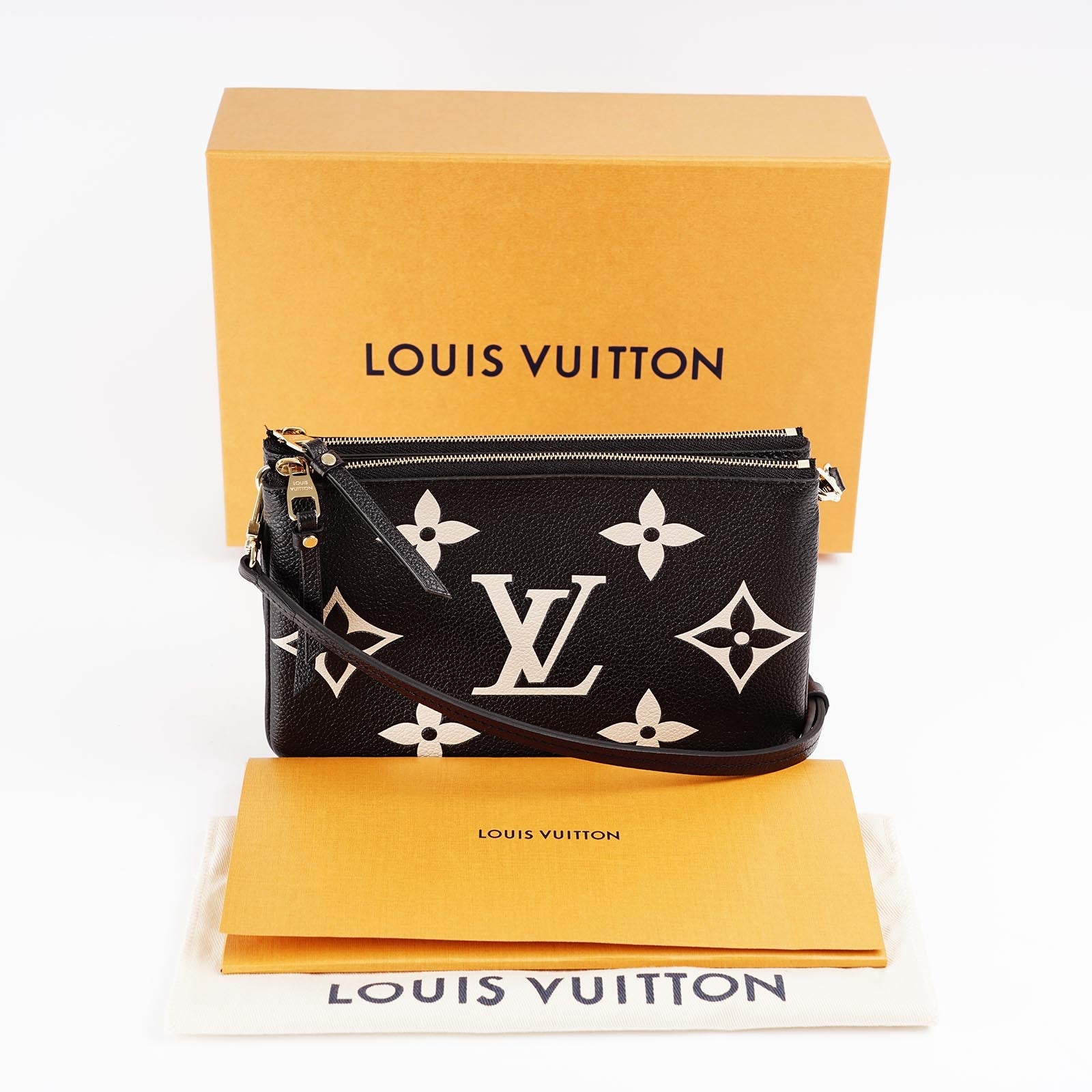 Pochette Double Zip On Strap - LOUIS VUITTON - Affordable Luxury image